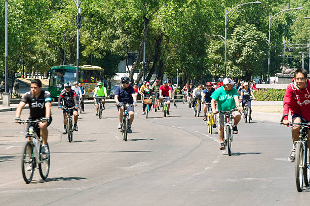Mexico City, Mexico - April 13, 2014: Bikers at the Mexico City sunday ride along Paseo de la Reforma. On sundays the avenue is closed to transit and is full of bikers, runners and families working out or doing outdoors activities.