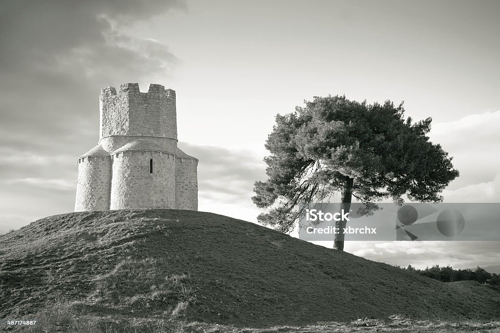 Dalmatian stone church on the hill Dalmatian stone church on the hill, near town of Nin, Croatia Ancient Stock Photo