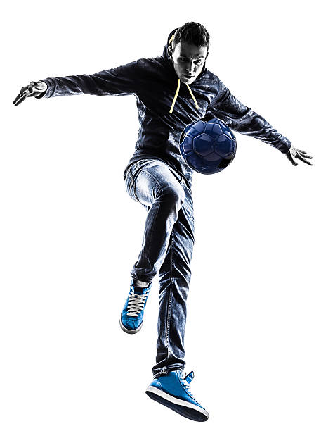 istock young man soccer freestyler player silhouette 487175495