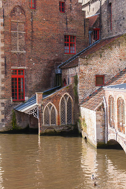 istock Traditional buildings and waterway, Bruges, Belgium 487176239