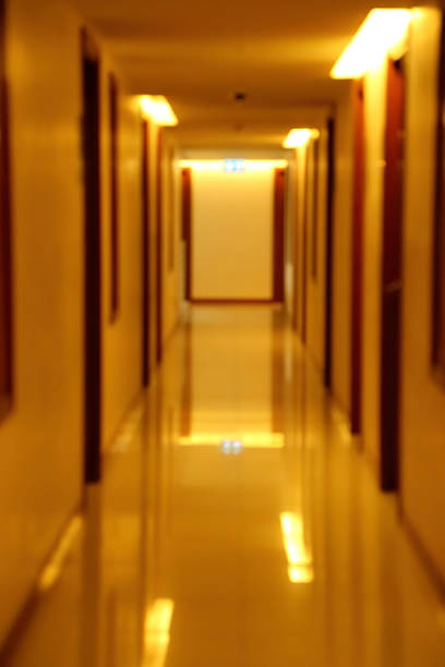 istock Blurred scene of hallway apartment building. 487176564