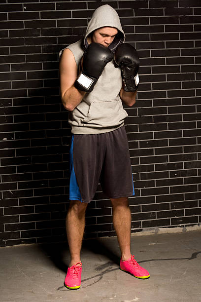 istock Anxious young boxer standing waiting for his match 487176655