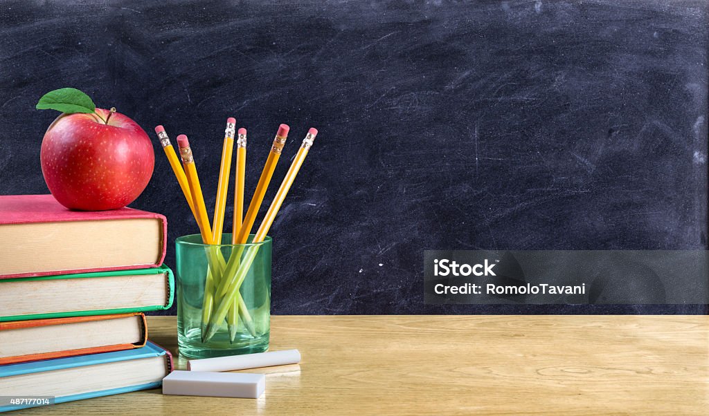 apple on books with pencils and empty blackboard back to school background with empty blackboard Chalkboard - Visual Aid Stock Photo