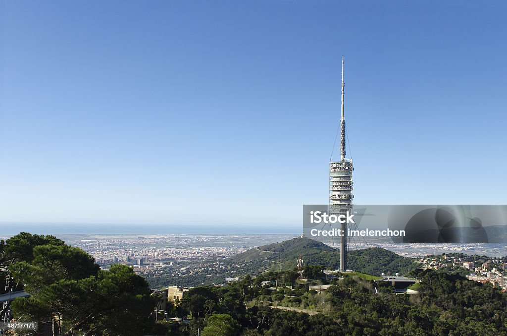 Foster Tower in Barcelona Foster Tower in Tibidabo with Hospitalet on Background. Barcelona - Spain Stock Photo