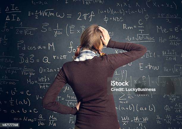 Student Have A Problem With Mathematics Stock Photo - Download Image Now - Mathematical Symbol, Mathematics, Confusion