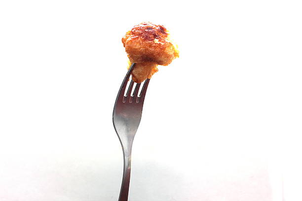 istock piece of fried cauliflower 487178164