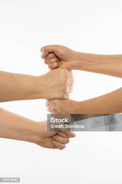 Foto de Formar Uma Equipe e mais fotos de stock de Dar as Mãos - Dar as Mãos, Homens, Mulheres