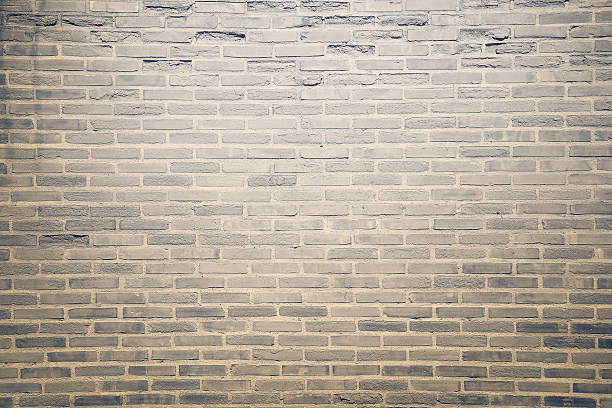 istock dark brown grunge brick wall texture background 487181878
