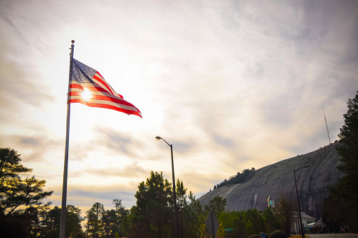 Image of an American Flag Flying over Stone Mountain, Georgia.