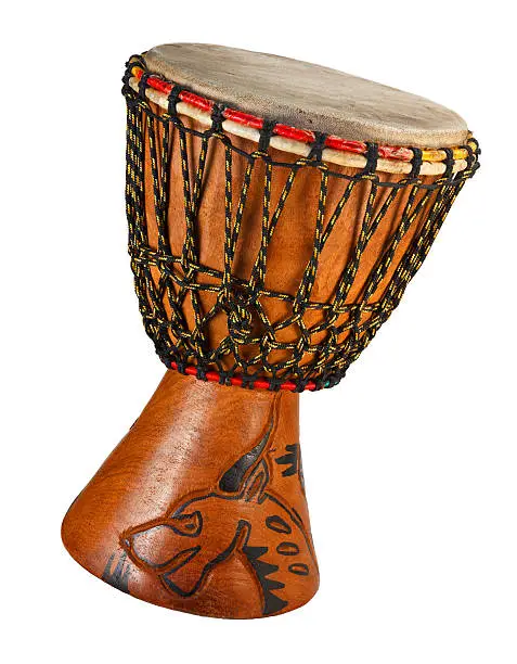 Djembe - ethnic drum made of wood and goat. Isolated object on a white background.