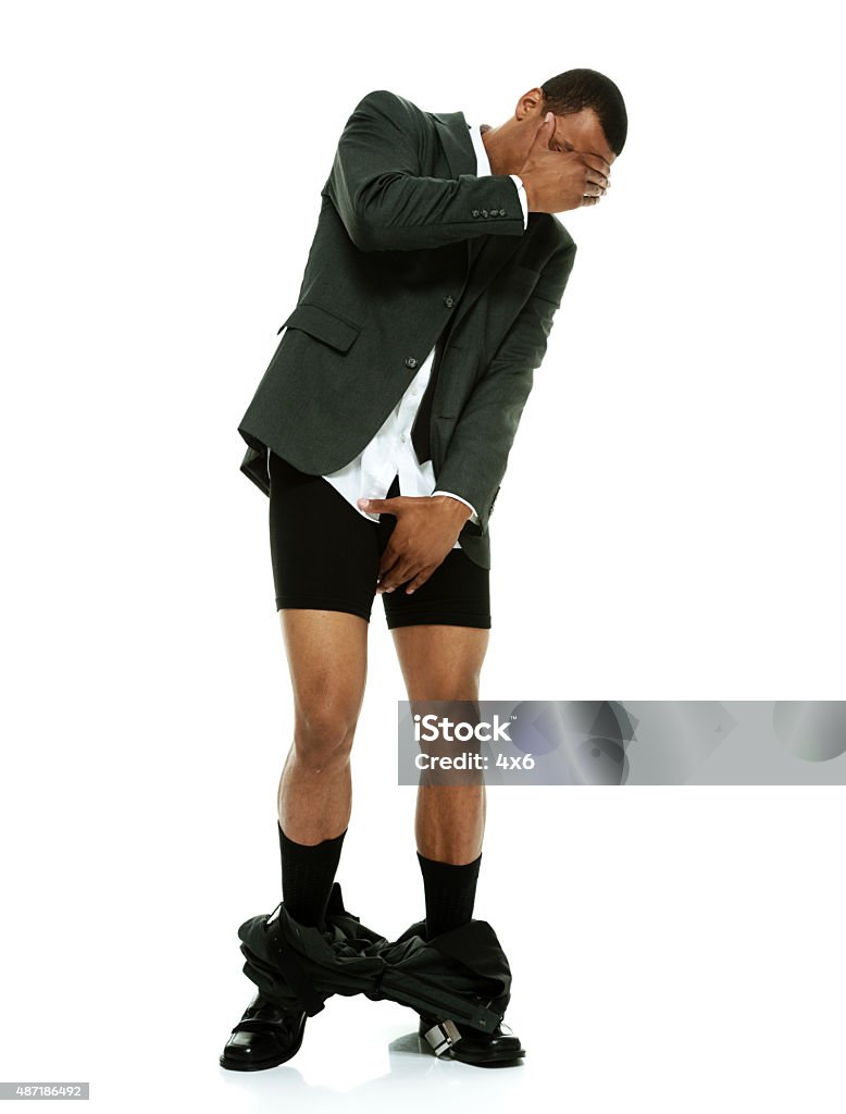 Businessman caught with his pants down Businessman caught with his pants downhttp://www.twodozendesign.info/i/1.png 20-24 Years Stock Photo