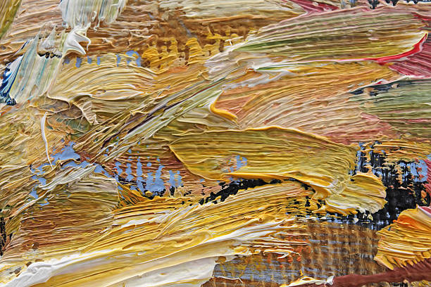 istock Multi-colored brush strokes of oil paint on canvas 487188066