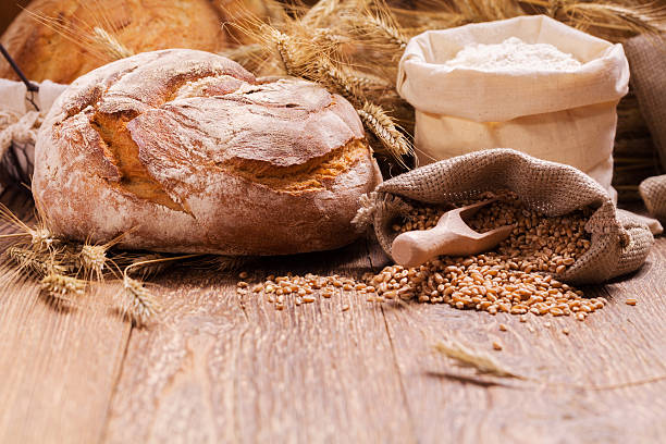 istock Composition of fresh bread, cereals and grains. 487191468