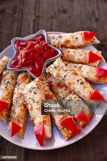 Cheesy Breadsticks Witch Fingers Stock Photo - Download Image Now - 2015, Appetizer, Baked