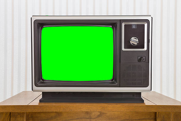 istock Analogue Portable Television on Table with Green Screen 487195502
