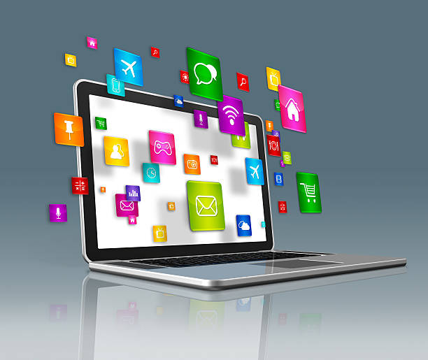 istock Laptop Computer and flying apps icons on a futuristic background 487195518