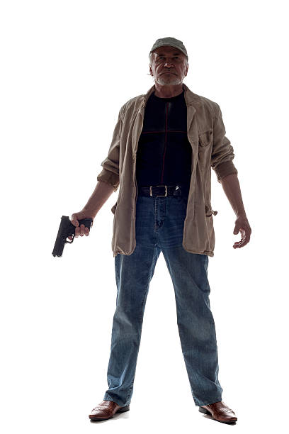 пожилой мужчина с пистолетом - death fear focus on shadow isolated objects стоковые фото и изображения