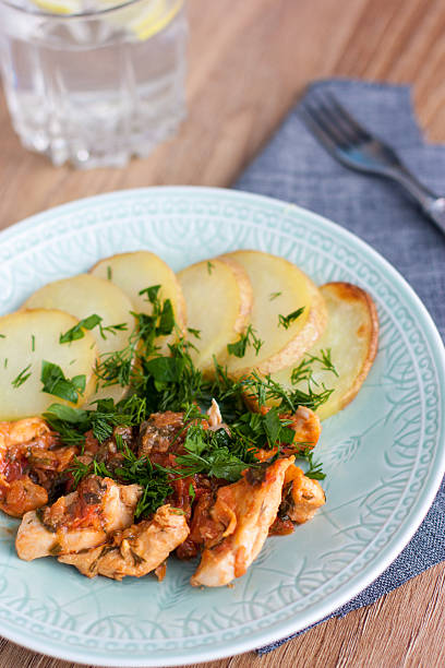 istock Baked potatoes with chicken 487200284