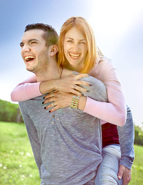 istock Smiling young couple have a fan 487200775