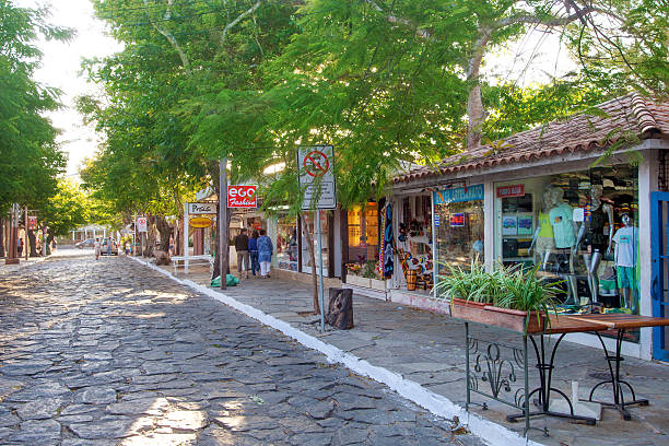 buzios main street-rua das pedras ",buzios main street-rua das pedras" - national landmark editorial color image horizontal stock-fotos und bilder