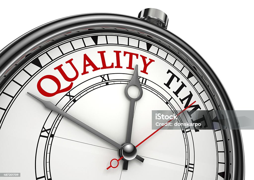 quality time concept clock quality time concept clock closeup isolated on white background with red and black words Balance Stock Photo