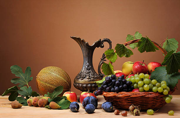 istock Fresh fruit and melon beside the metal jug 487201975