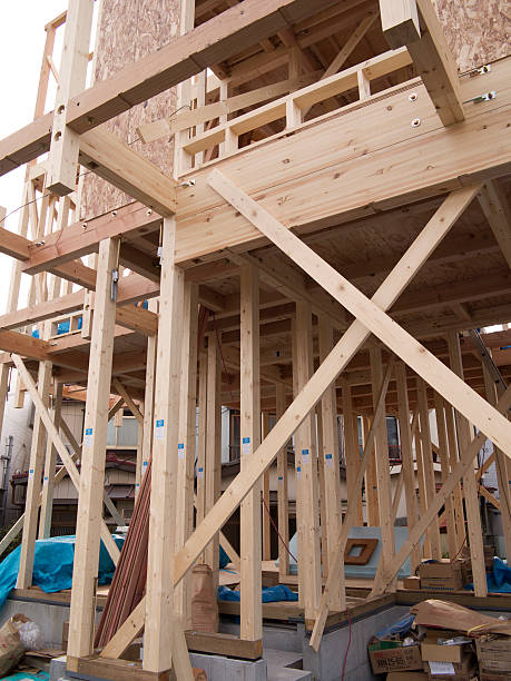 istock Construction site of the wooden house. 487202039