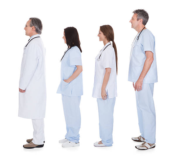 istock Group Of Doctor Standing In A Row 487203351