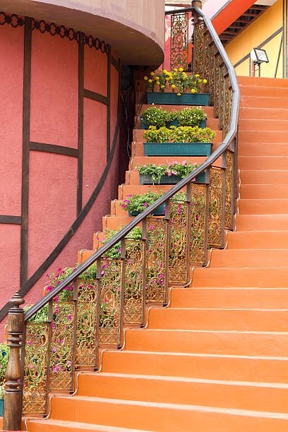 istock Marble stairs with wooden railing 487205095
