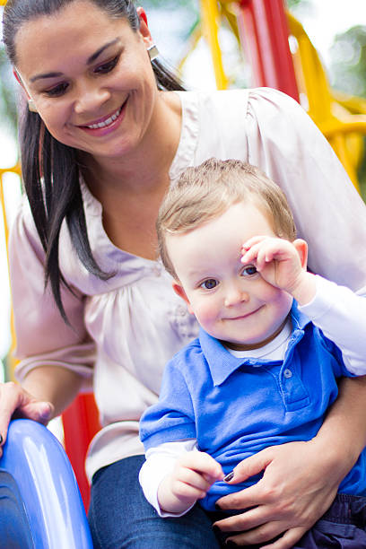 istock Happy mom having fun at the park 487205615