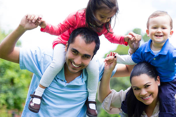 istock Family playing at the park 487205665