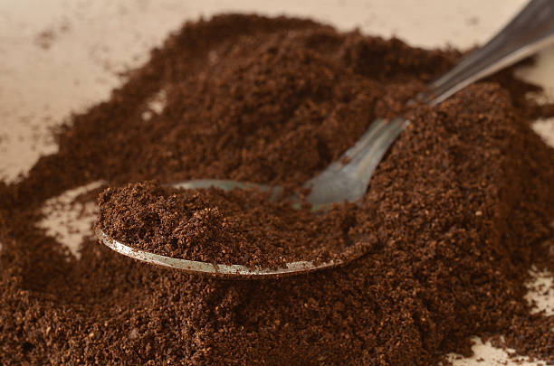 istock Spoon in light dark powder of coffee 487206574