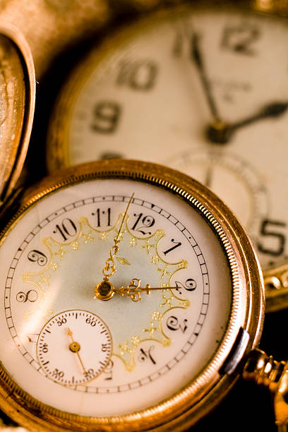 istock Time: Two antique pocket watches, clocks. 487206893