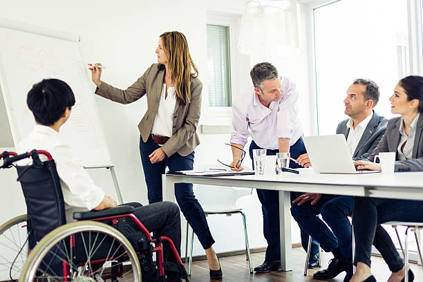 istock business team having a meeting 487210254