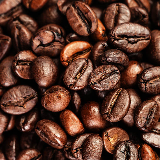 istock Coffee background. Brown cofee beans, close up of coffe 487210784