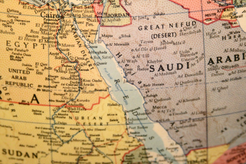 A portion of a globe showing the Middle East is photographed.