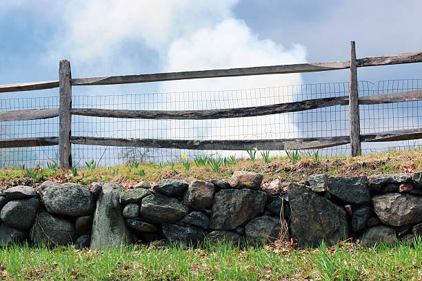 istock farm fence with looming sky 487222715