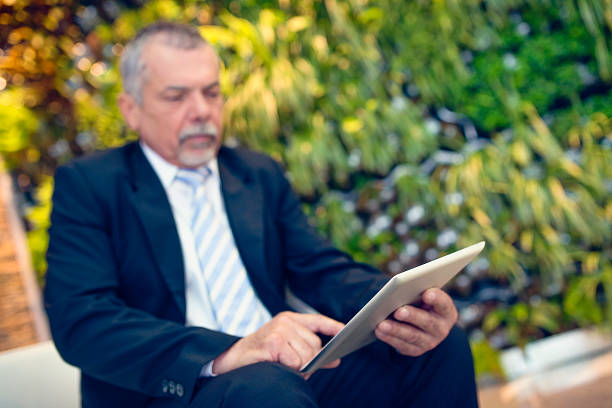 istock Businessman In The Lobby 487223137