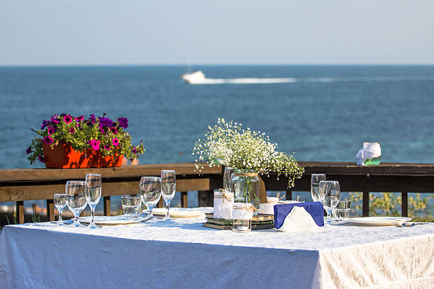 istock Elegant summer wedding table in front of the beach 487225218