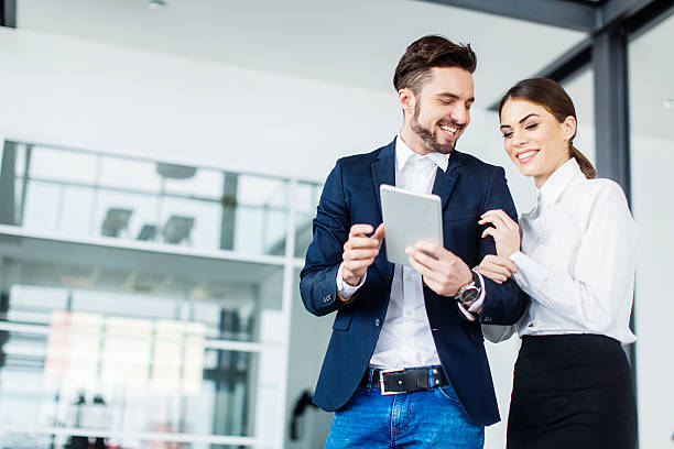 istock Young people with tablet in the office 487225446