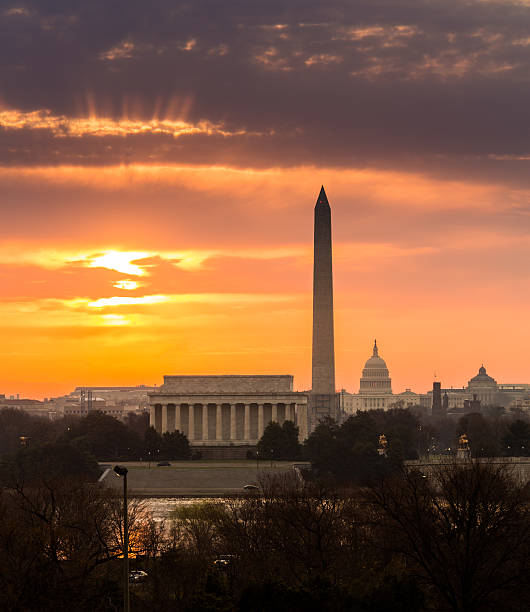 istock Fiery sunrise over monuments of Washington 487225577
