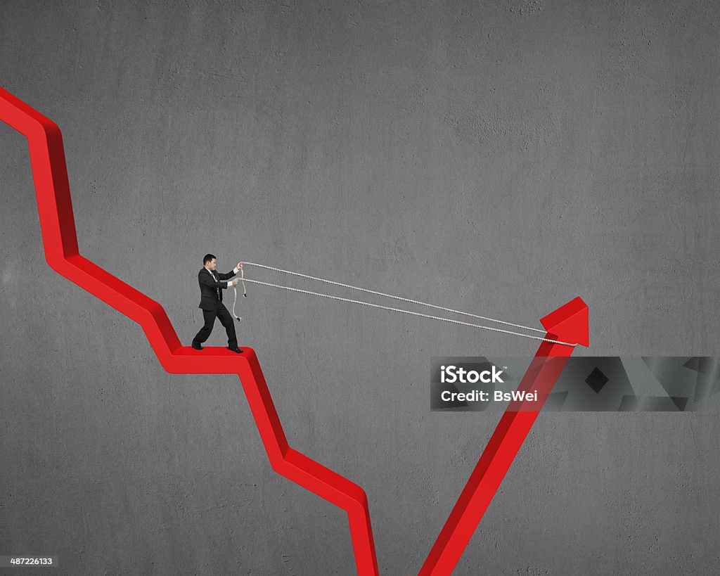 Man Pulling Up Going Down Red Arrow Stock Photo - Download Image Now ...