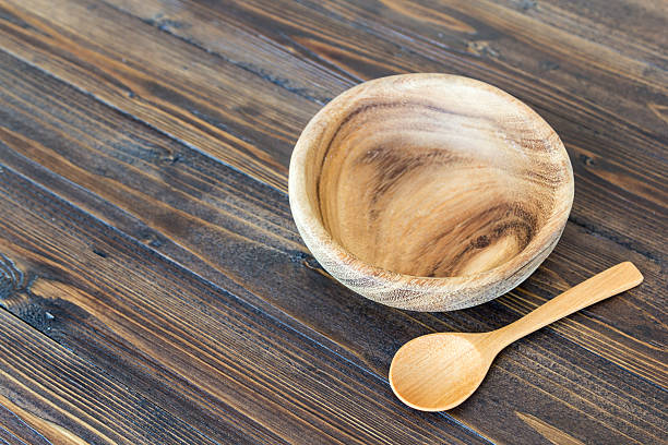 istock Wood bowl and wood spoon 487229166