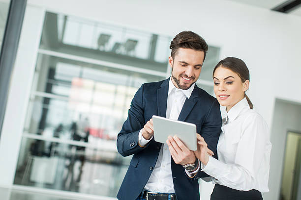 istock Young people with tablet in the office 487229656
