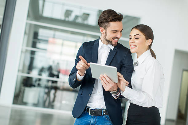 istock Young people with tablet in the office 487229670