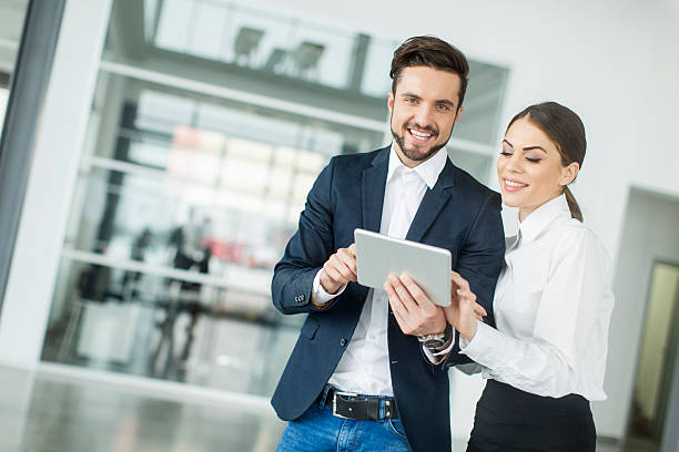 istock Young people with tablet in the office 487229684