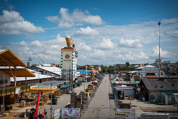 Oktoberfest Munich 2015 build up early September Munich, Germany - September 4, 2015: Oktoberfest Munich 2015 build up early September - overview. See the Oktoberfest Area, which is a construction zone and closed for the public at the moment. Tents and carusels are build up at the moment. large german beer steins stock pictures, royalty-free photos & images