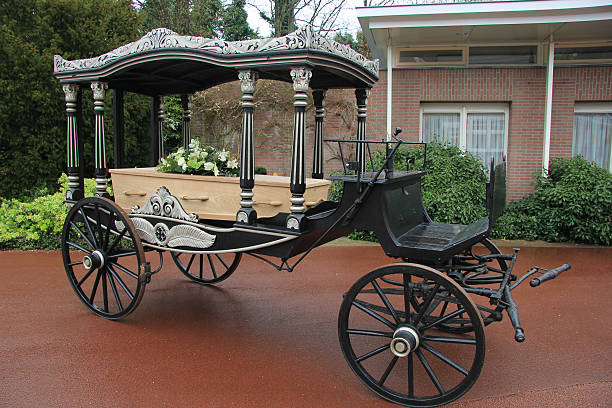 Classic funeral carriage with coffin stock photo