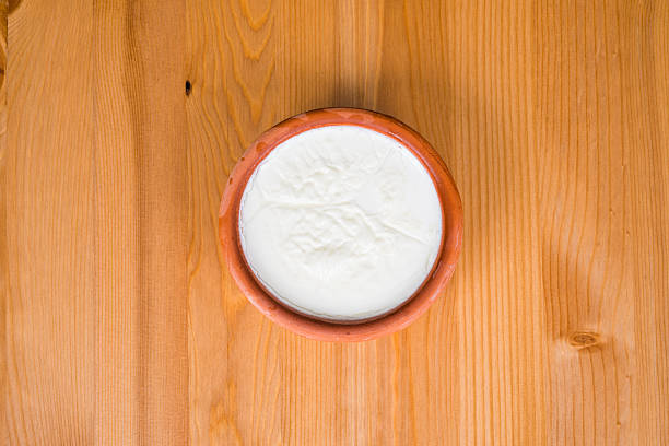 istock Traditional Turkish yogurt with kaymak in a pot 487249966