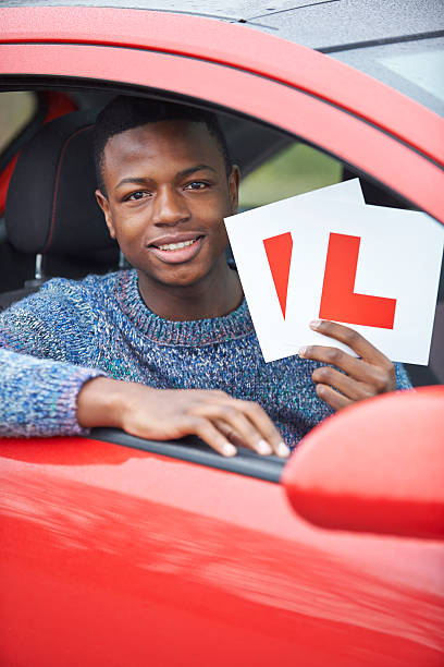 istock Teenage Boy Passing Driving Test 487250943